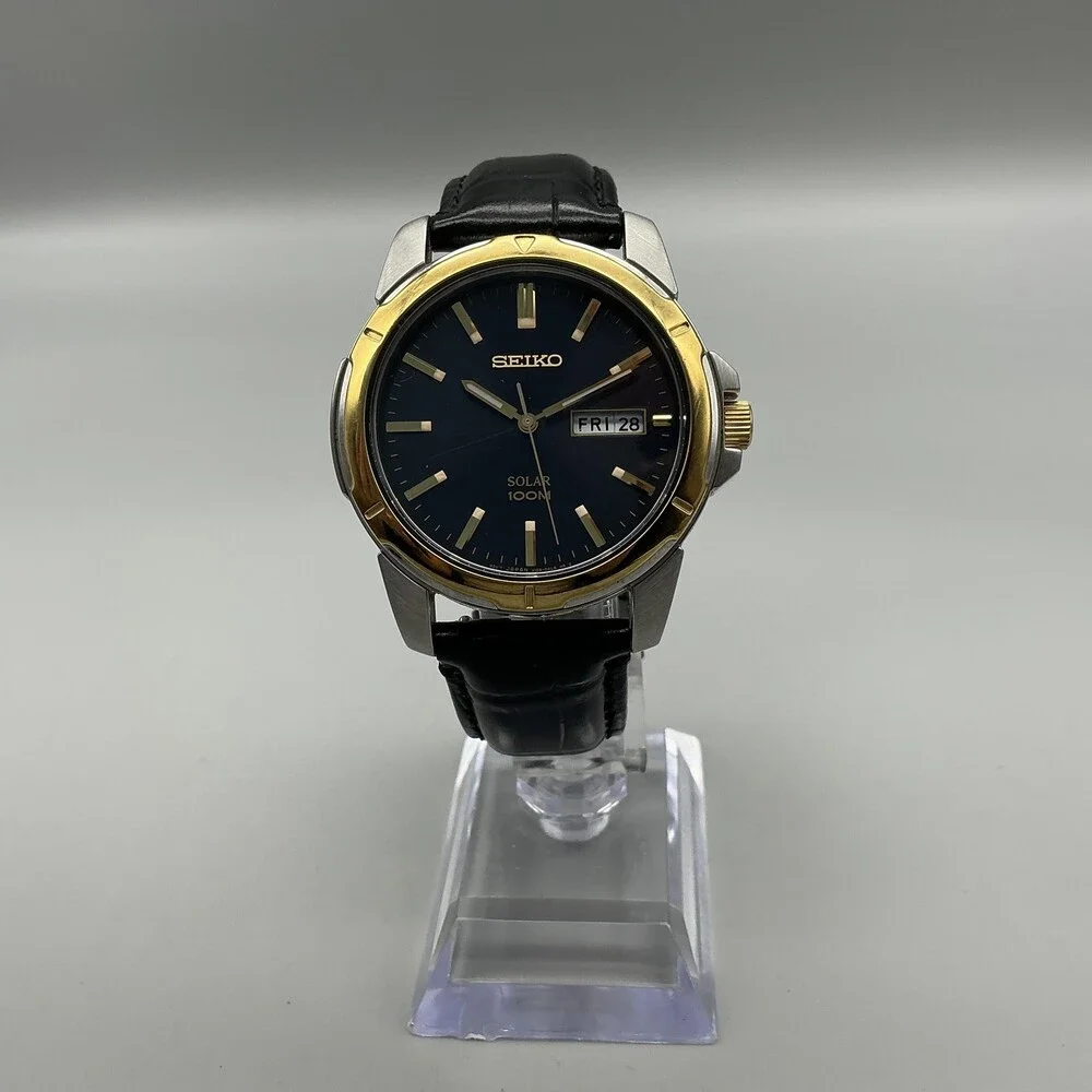 Seiko Solar Mens Watch 37mm Blue Dial Two Tone Black Leather Day Date V158-0AD0